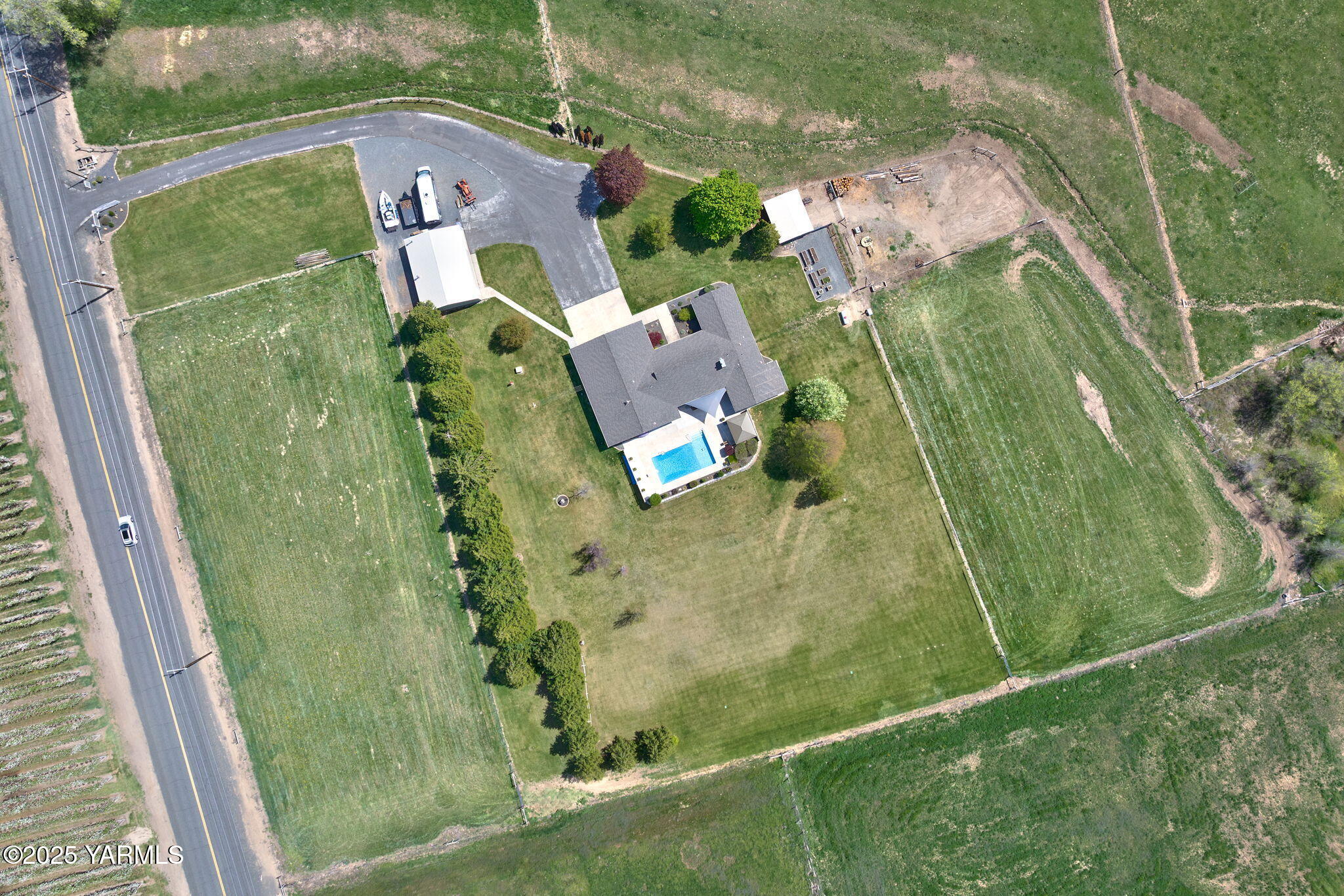 9370 Bittner Road Yakima, WA 98901 - Photo 3 of 38 an aerial view of a residential houses with outdoor space