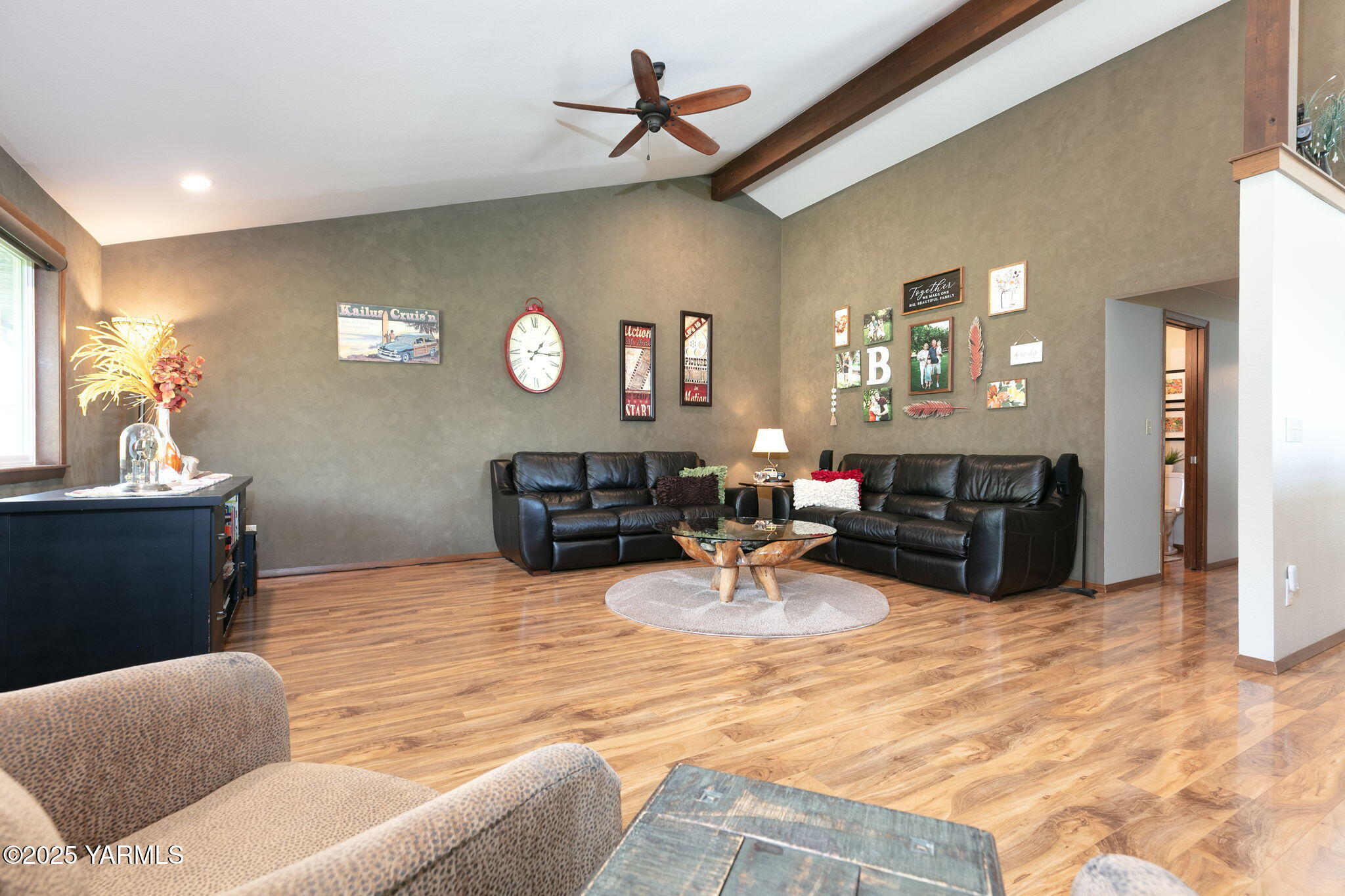 9370 Bittner Road Yakima, WA 98901 - Photo 9 of 38 a living room with furniture and a flat screen tv
