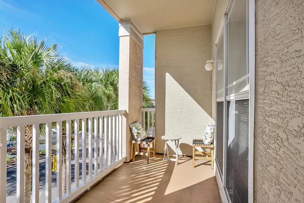 a view of a swimming pool with a lounge chairs