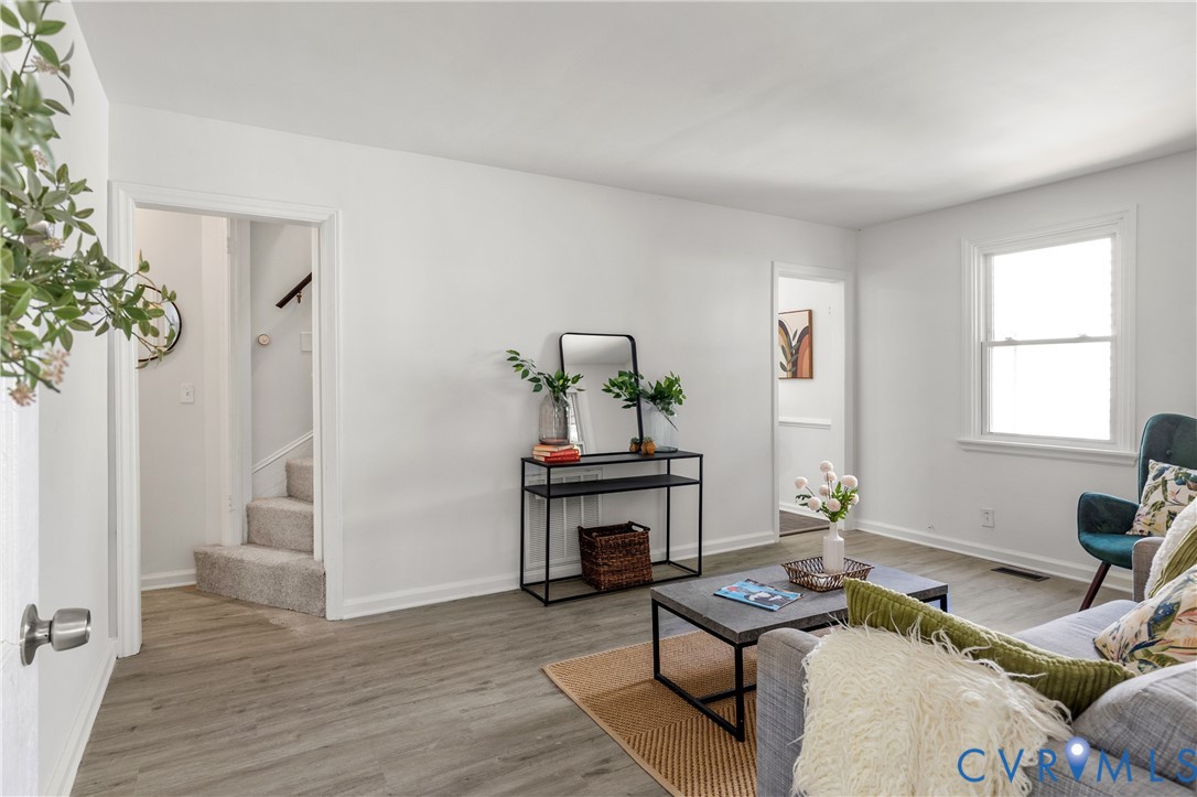 3406 Meadowbridge Road Richmond, VA 23222 - Photo 3 of 12 Living area featuring wood-finish flooring, white