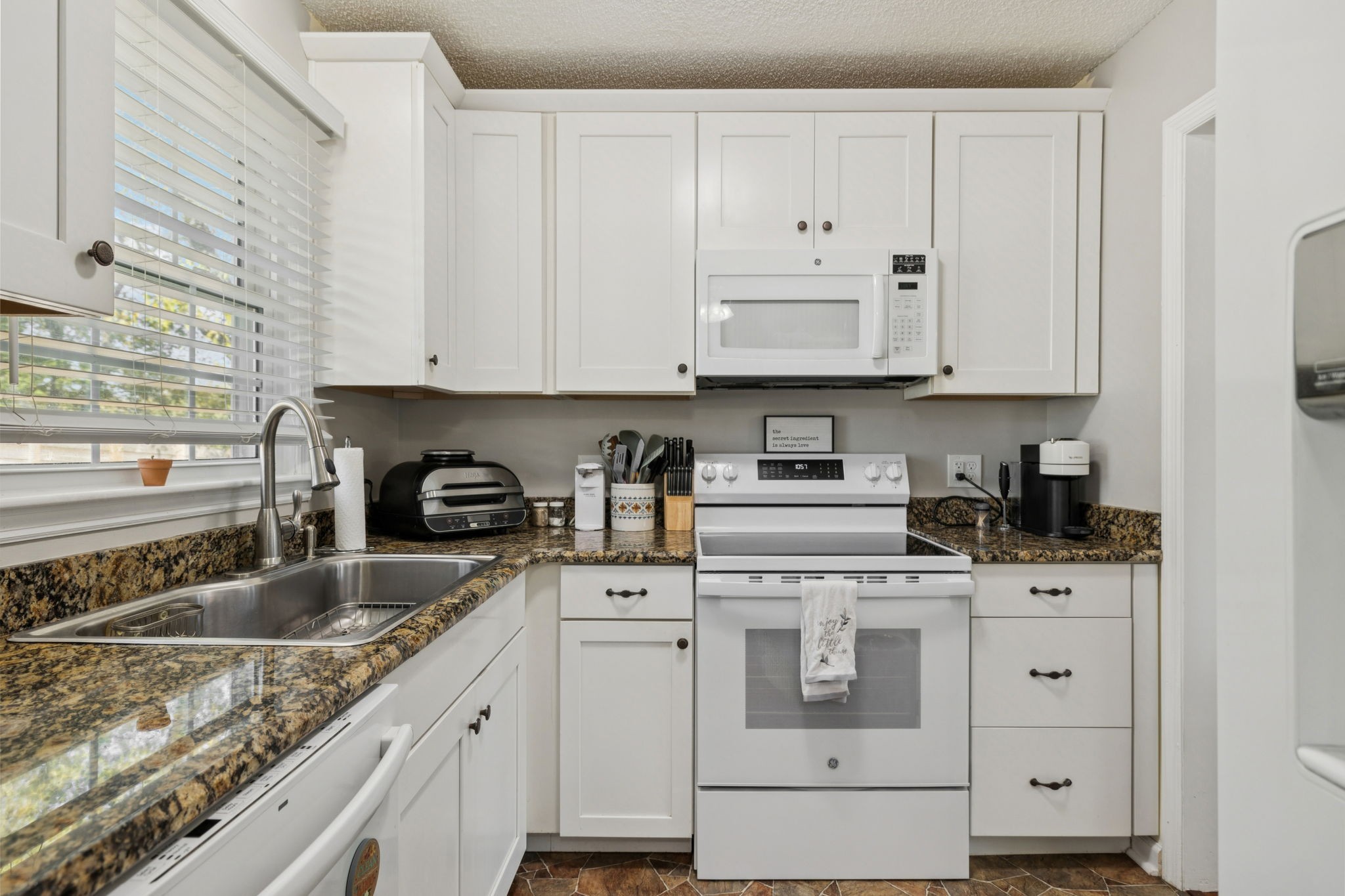 900 Ridge West Hermitage, TN 37076 - Photo 11 of 38 a kitchen with appliances cabinets and a sink