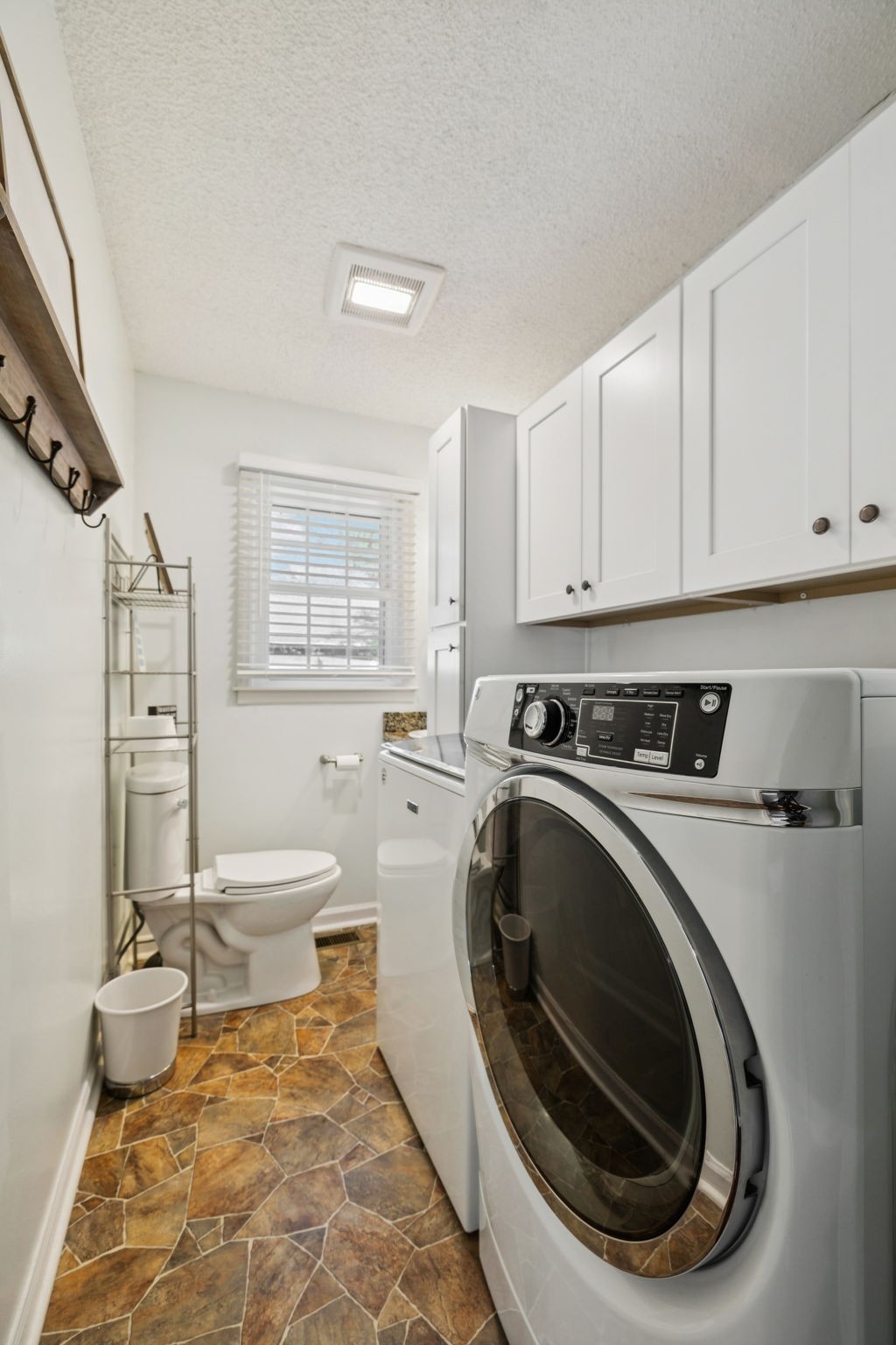 900 Ridge West Hermitage, TN 37076 - Photo 16 of 38 a view of a kitchen with a washer and dryer