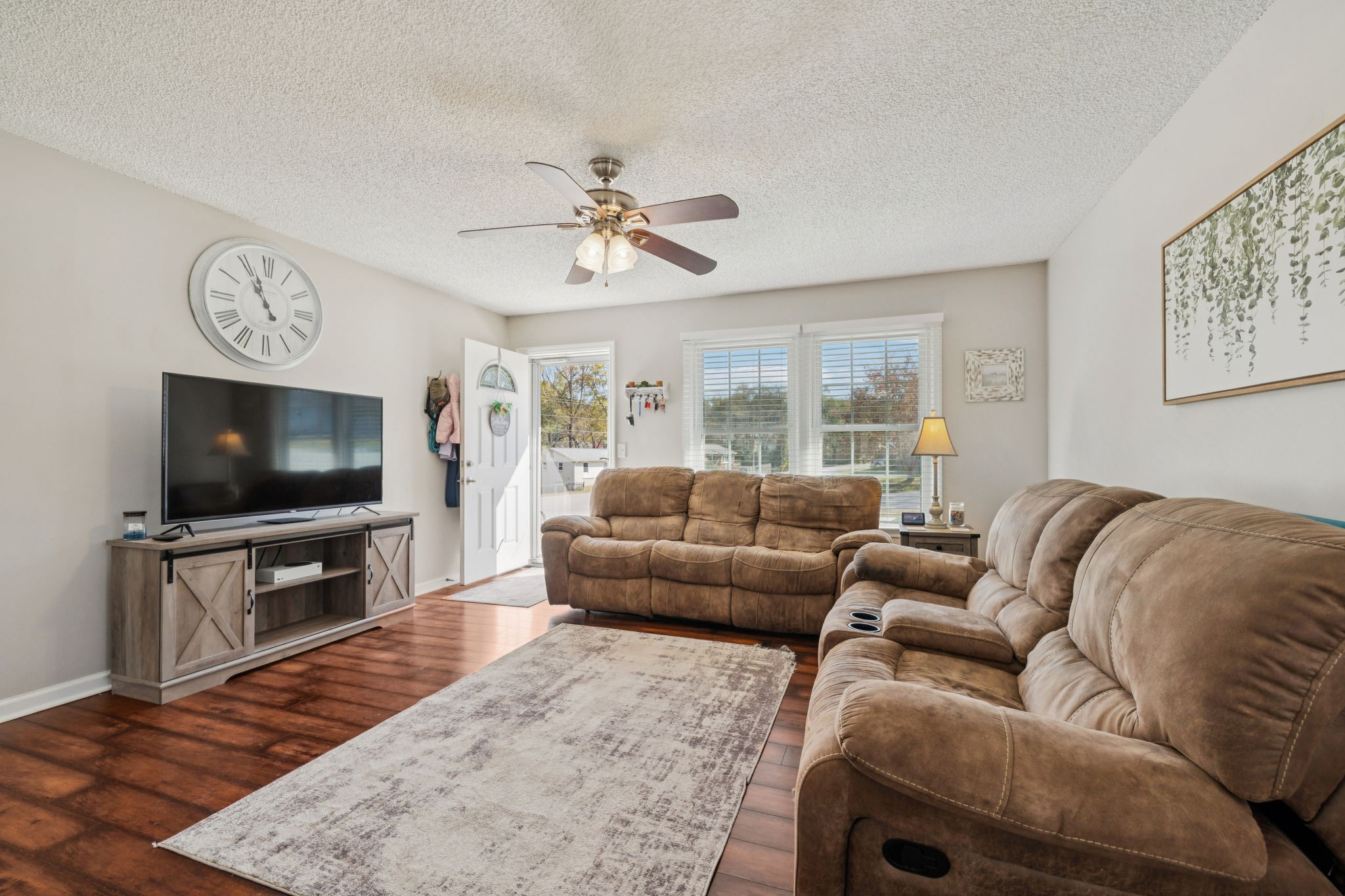900 Ridge West Hermitage, TN 37076 - Photo 8 of 38 a living room with furniture and a flat screen tv