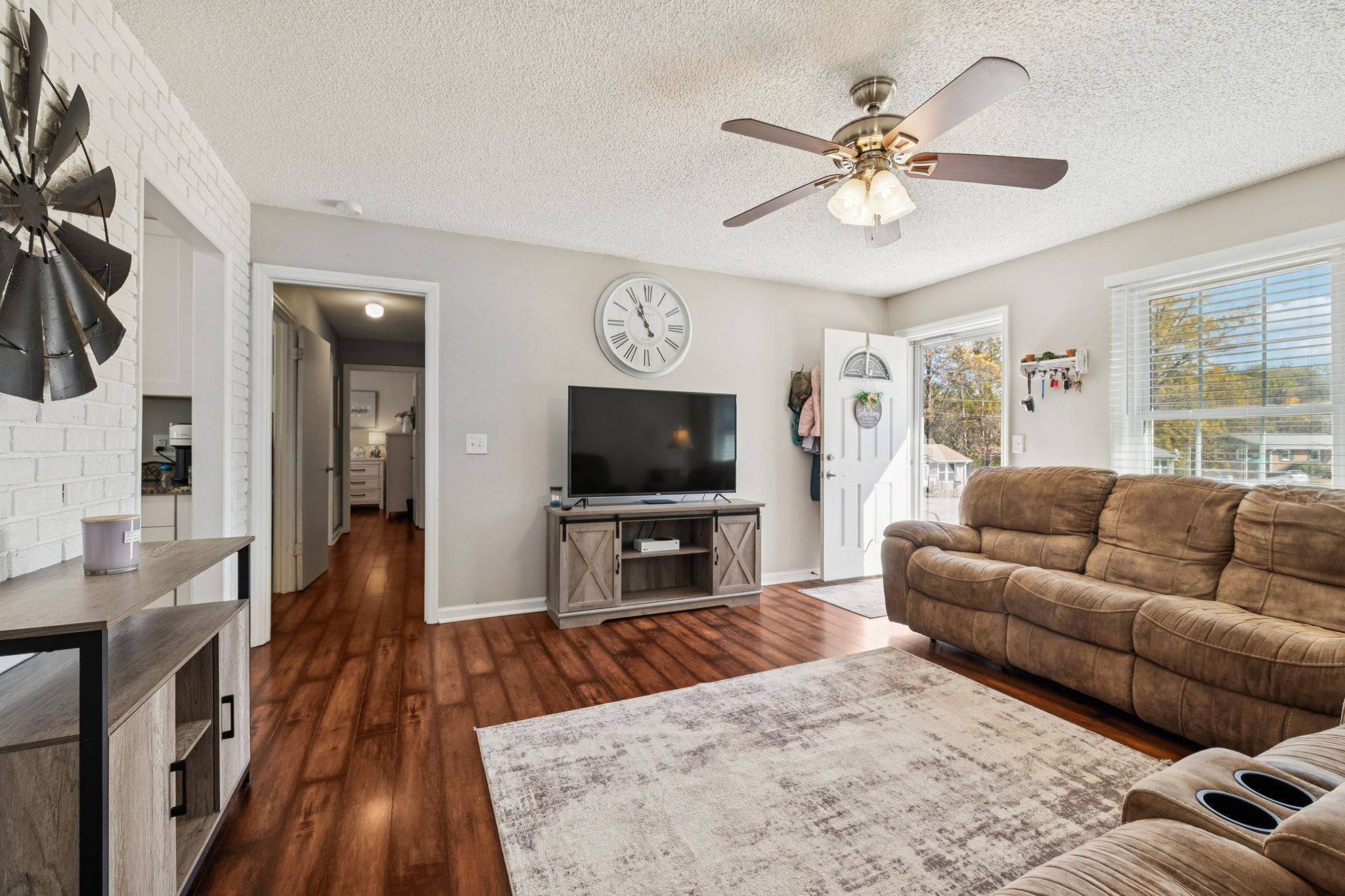 900 Ridge West Hermitage, TN 37076 - Photo 9 of 38 a living room with furniture and a flat screen tv