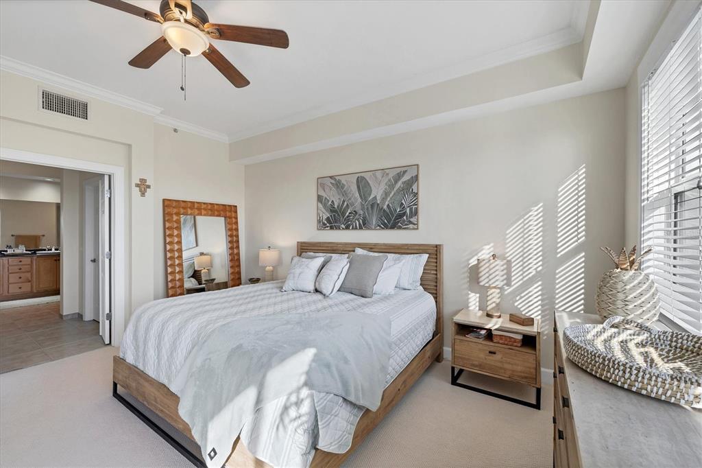 8541 Amberjack Circle, Unit 203 Englewood, FL 34224 - Photo 22 of 52 a bedroom with a bed and window