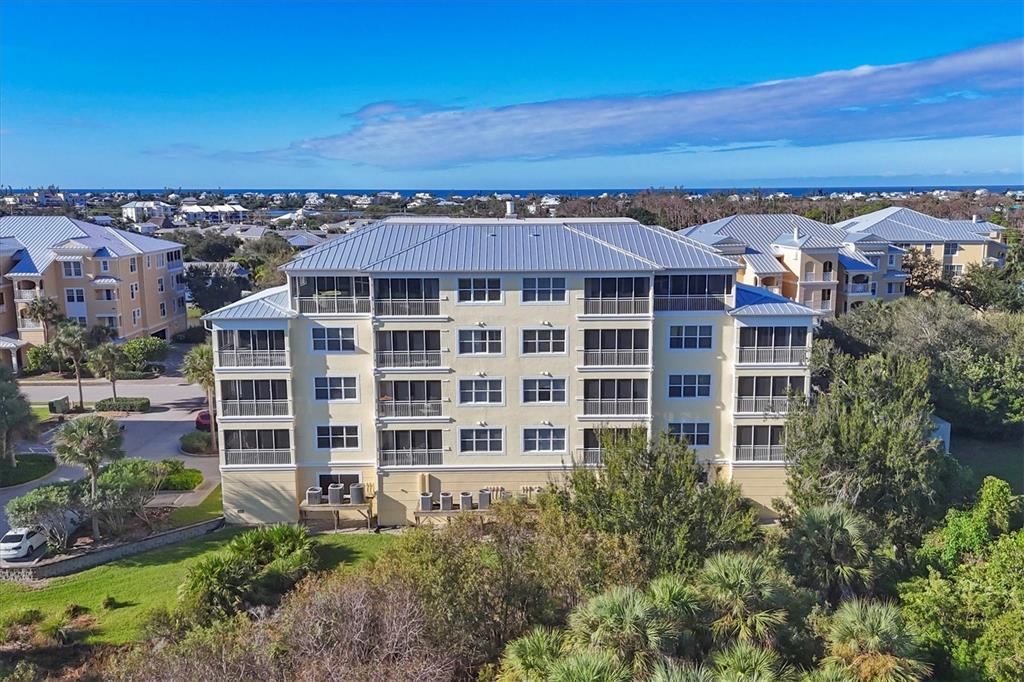 8541 Amberjack Circle, Unit 203 Englewood, FL 34224 - Photo 35 of 52 aerial view of a large building