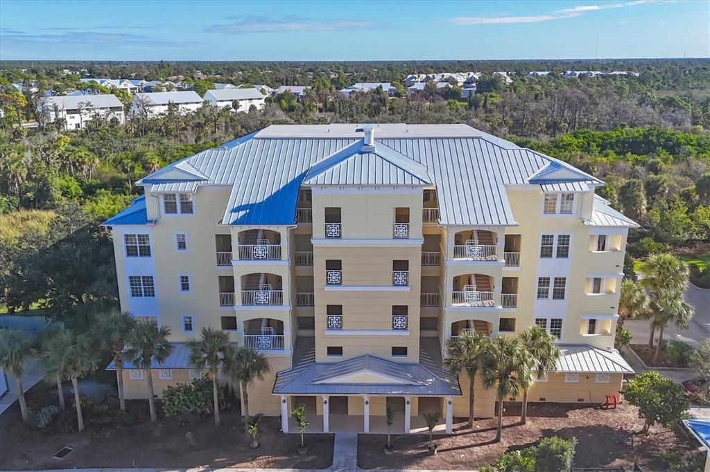 8541 Amberjack Circle, Unit 203 Englewood, FL 34224 - Photo 4 of 52 a front view of a building