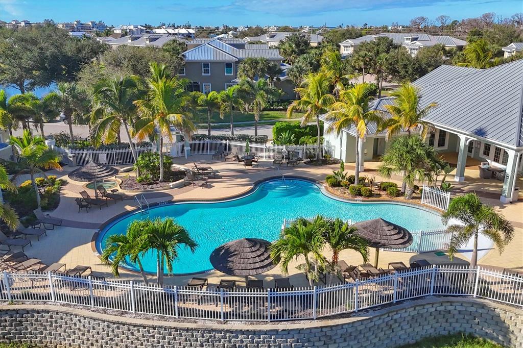 8541 Amberjack Circle, Unit 203 Englewood, FL 34224 - Photo 50 of 52 a view of a swimming pool with a patio