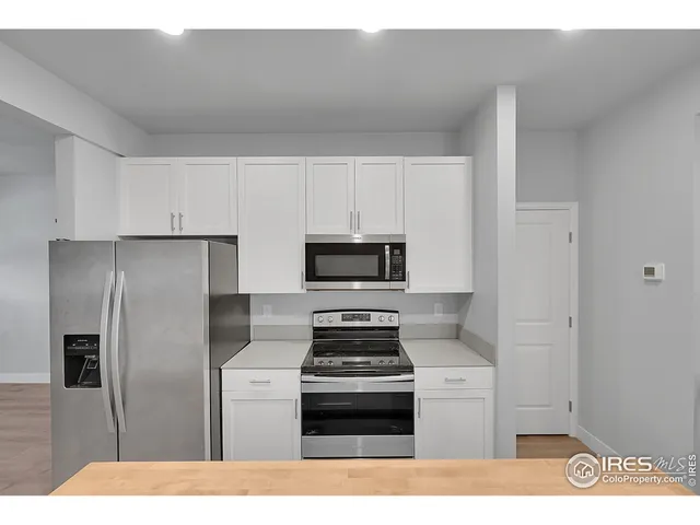 a bathroom with a sink toilet a mirror and bathtub