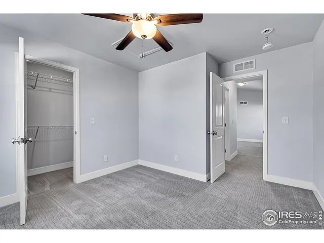 a view of an house with backyard and swimming pool