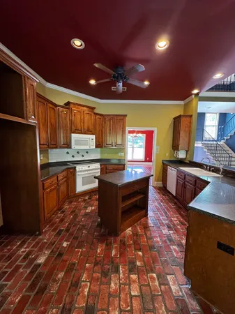 a kitchen with granite countertop lots of counter top space