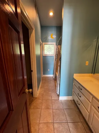 a room with window and stairs