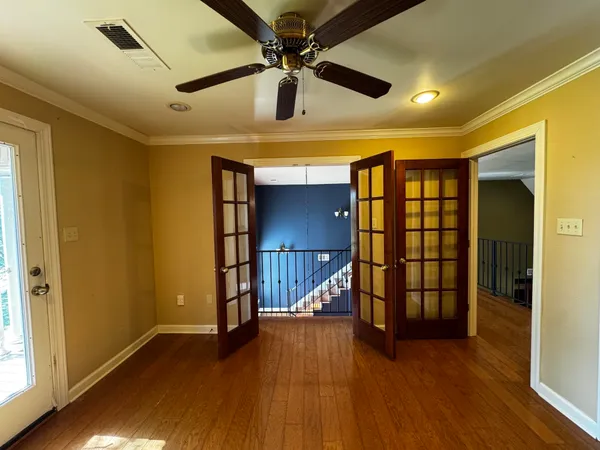 a view of entryway with wooden floor