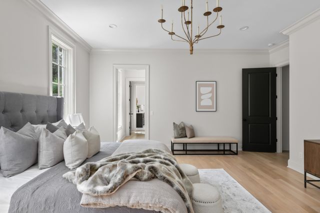 a bedroom with furniture and a couch