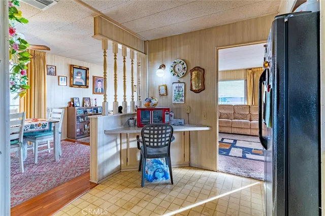 a bed room with a bed and a dresser