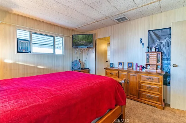a spacious bathroom with a sink double vanity and a mirror