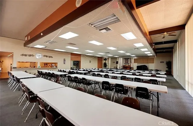 a view of swimming pool with outdoor seating