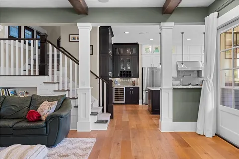 a view of a living room and floor to ceiling window