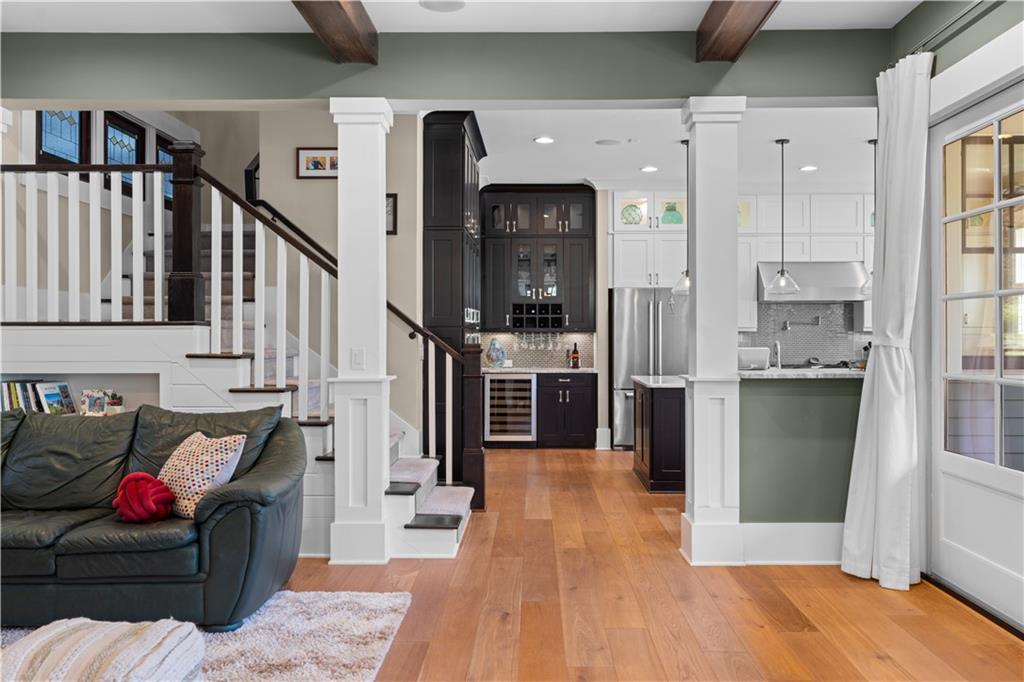958 Austin Avenue Northeast Atlanta, GA 30307 - Photo 13 of 68 a living room with furniture and kitchen view