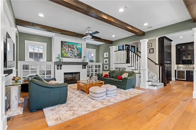 a kitchen with stainless steel appliances kitchen island wooden cabinets and stove