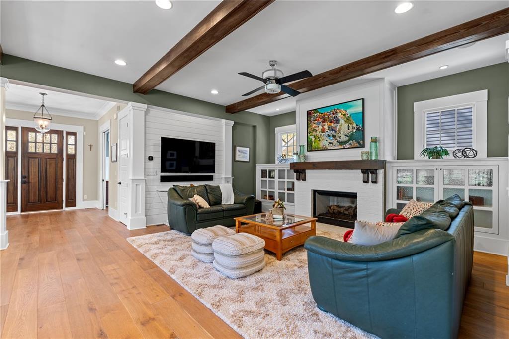 958 Austin Avenue Northeast Atlanta, GA 30307 - Photo 16 of 68 a living room with fireplace furniture and a flat screen tv