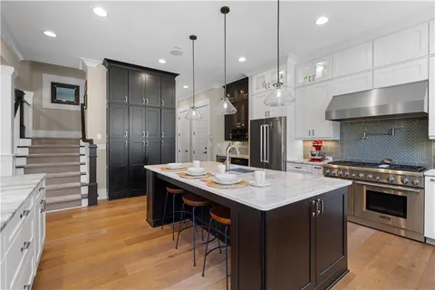 a bathroom with a sink a toilet and a bathtub