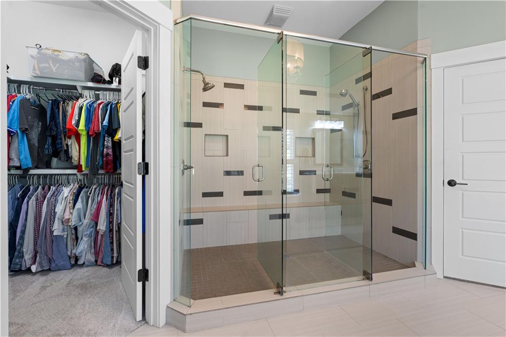 958 Austin Avenue Northeast Atlanta, GA 30307 - Photo 44 of 68 a view of walk in closet with clothes