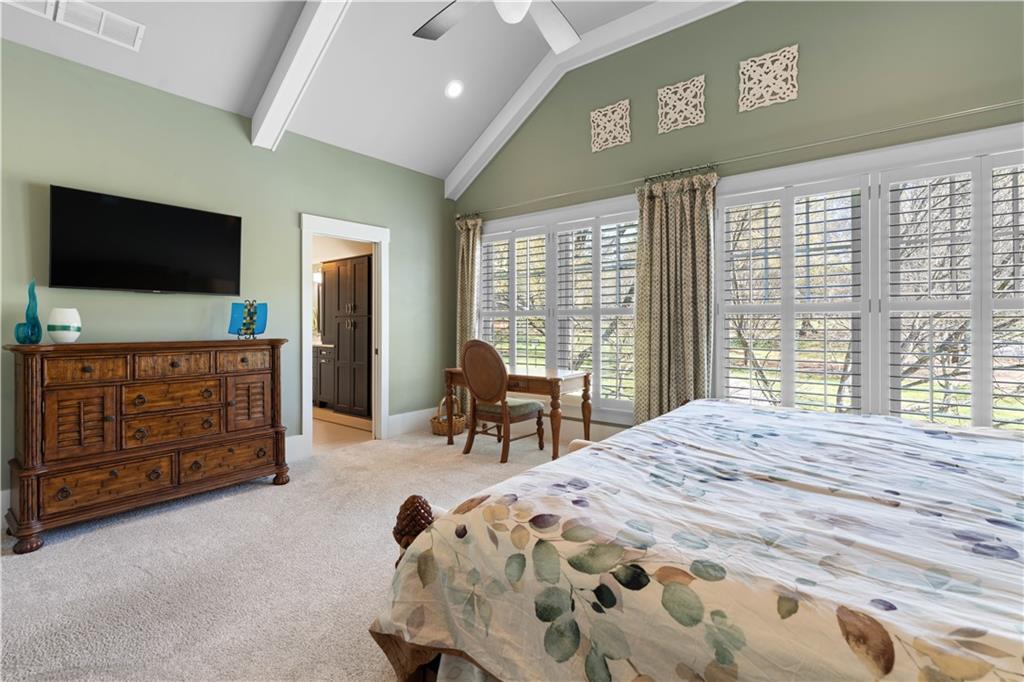 958 Austin Avenue Northeast Atlanta, GA 30307 - Photo 49 of 68 a bedroom with a bed and a television in it