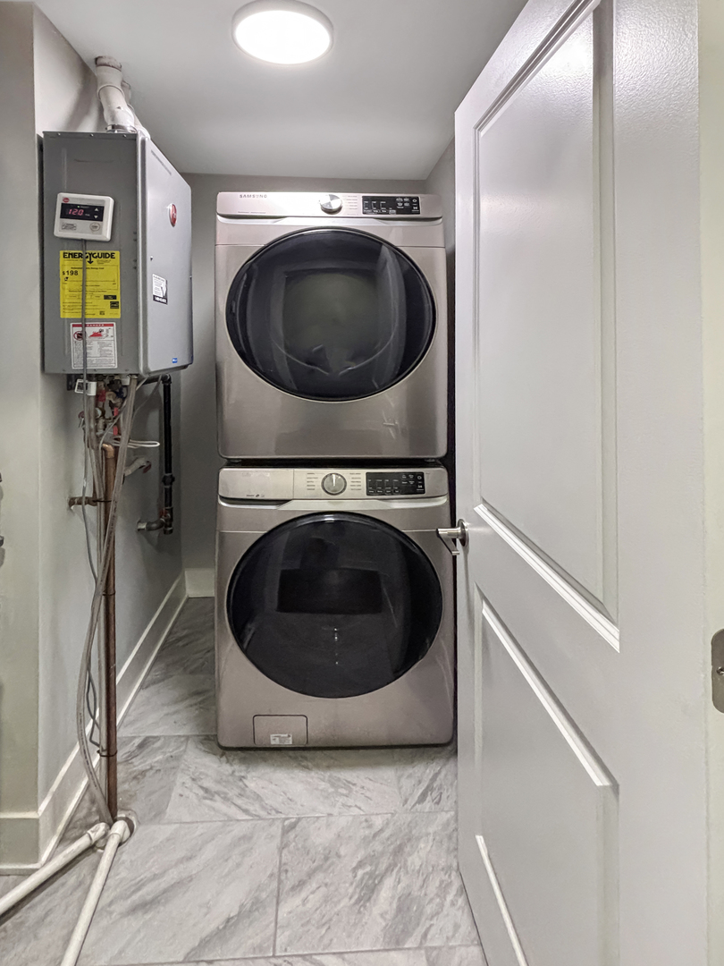 1634 West Cermak Road, Unit 3 Chicago, IL 60608 - Photo 17 of 19 a utility room with dryer and washer