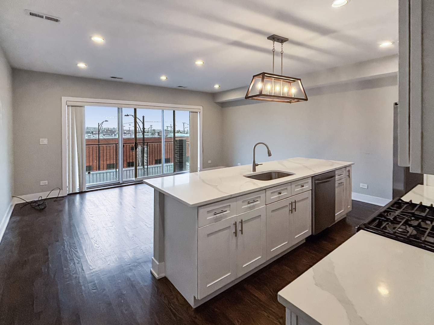 1634 West Cermak Road, Unit 3 Chicago, IL 60608 - Photo 4 of 19 a view of a kitchen sink and wooden floor