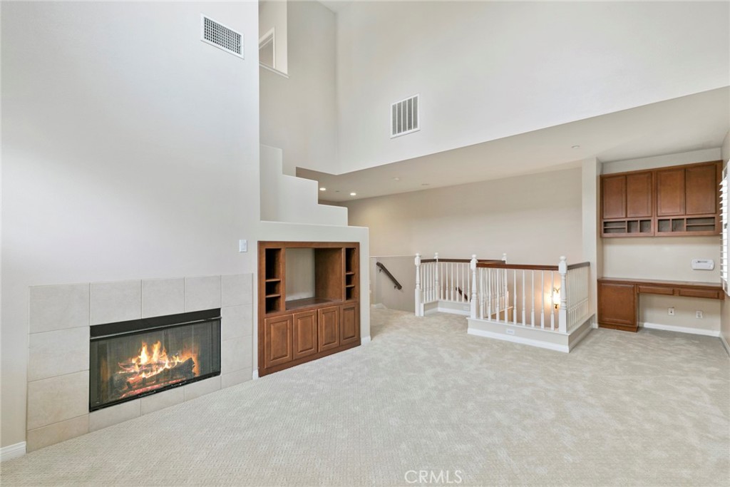 45 Perennial Irvine, CA 92603 - Photo 1 of 40 a view of an empty room and fire place