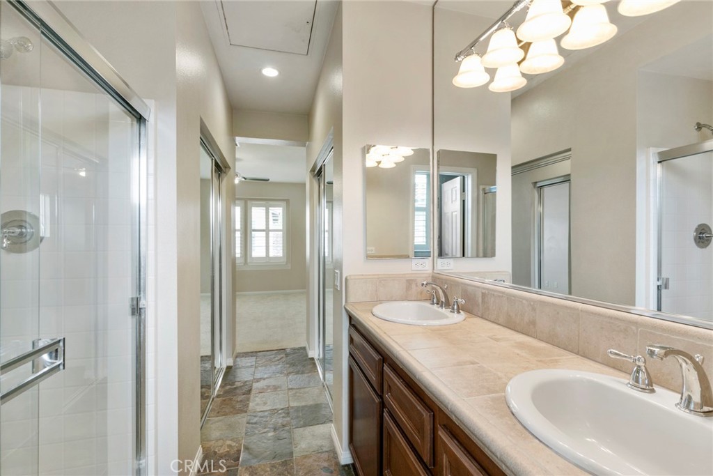 45 Perennial Irvine, CA 92603 - Photo 9 of 40 a bathroom with a sink a light fixture and a mirror