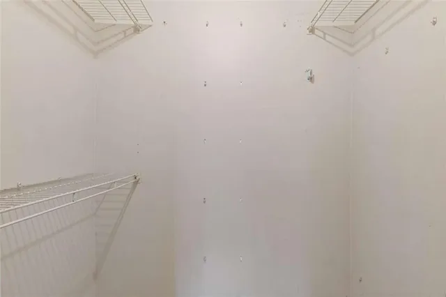 a view of a room with racks on the wall