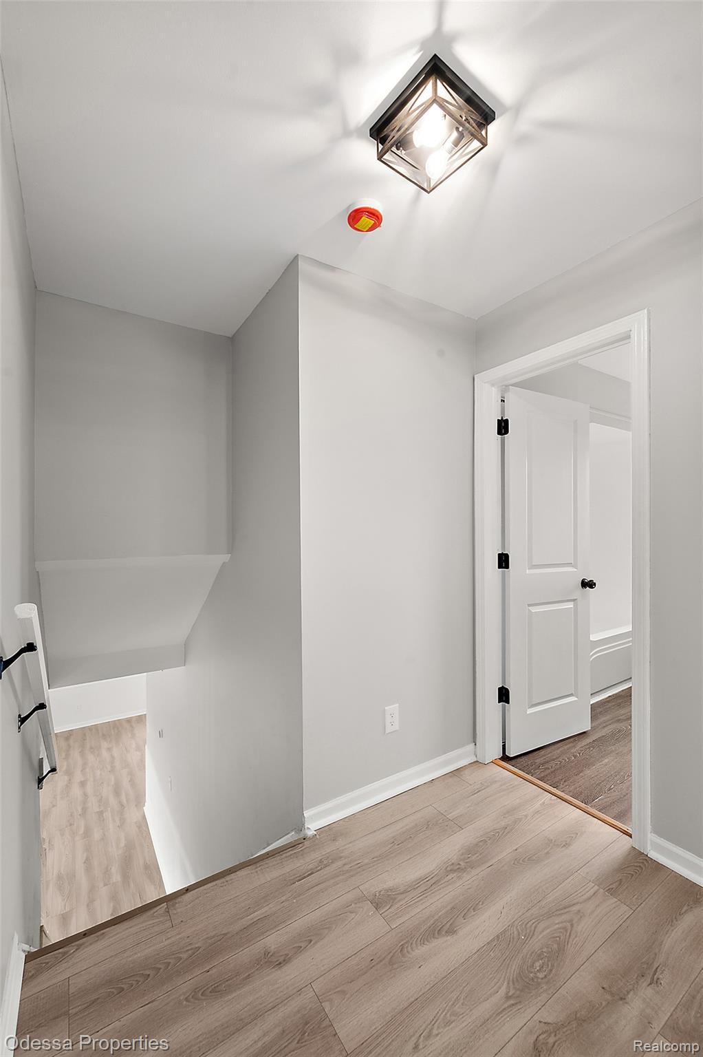 1442 Riley Center Road Memphis, MI 48041 - Photo 33 of 62 Bonus room with light wood-style floors and baseboards