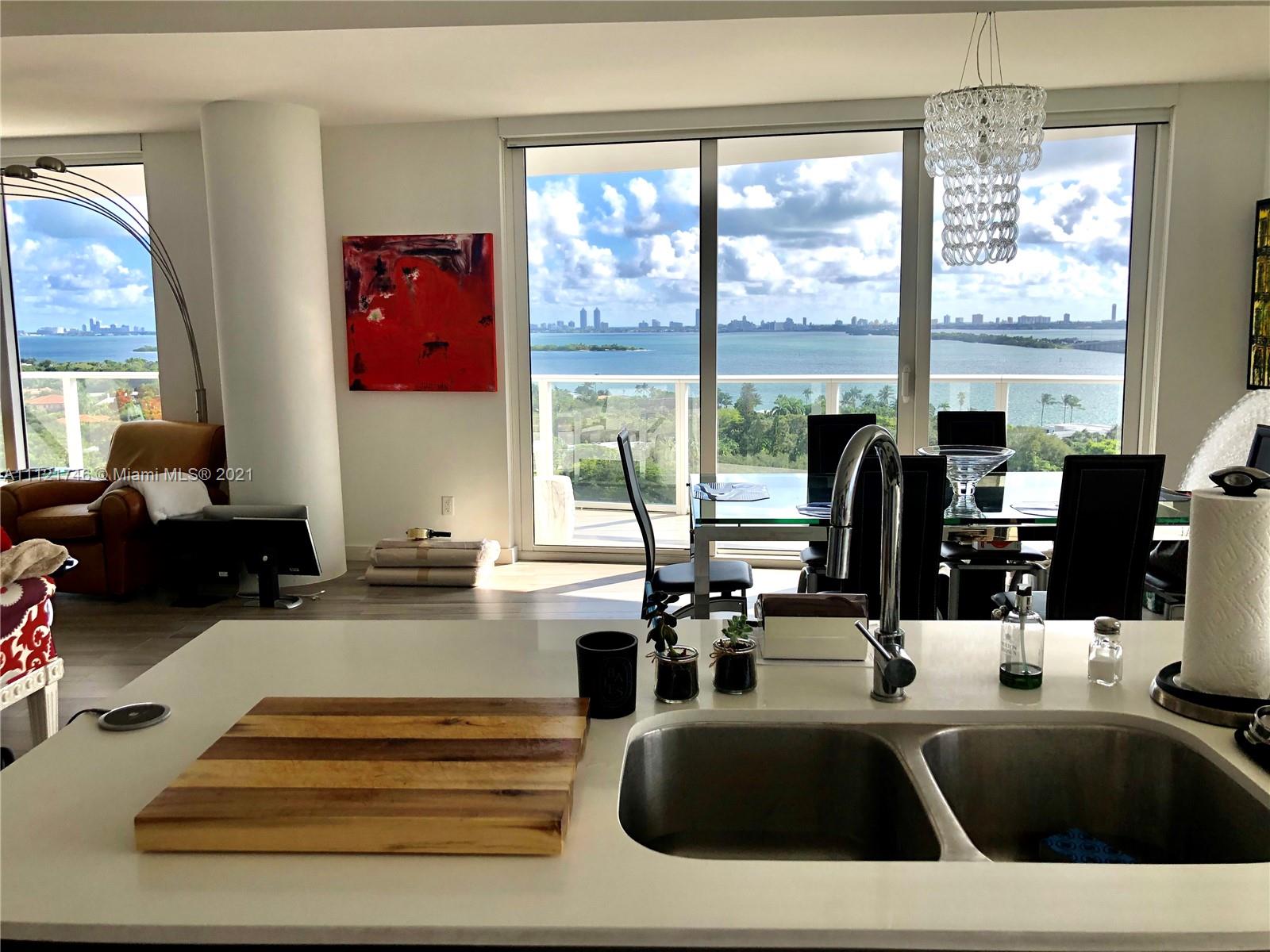 4250 Biscayne Boulevard, Unit 1601 Miami, FL 33137 - Photo 10 of 18 a kitchen with a large window and a sink