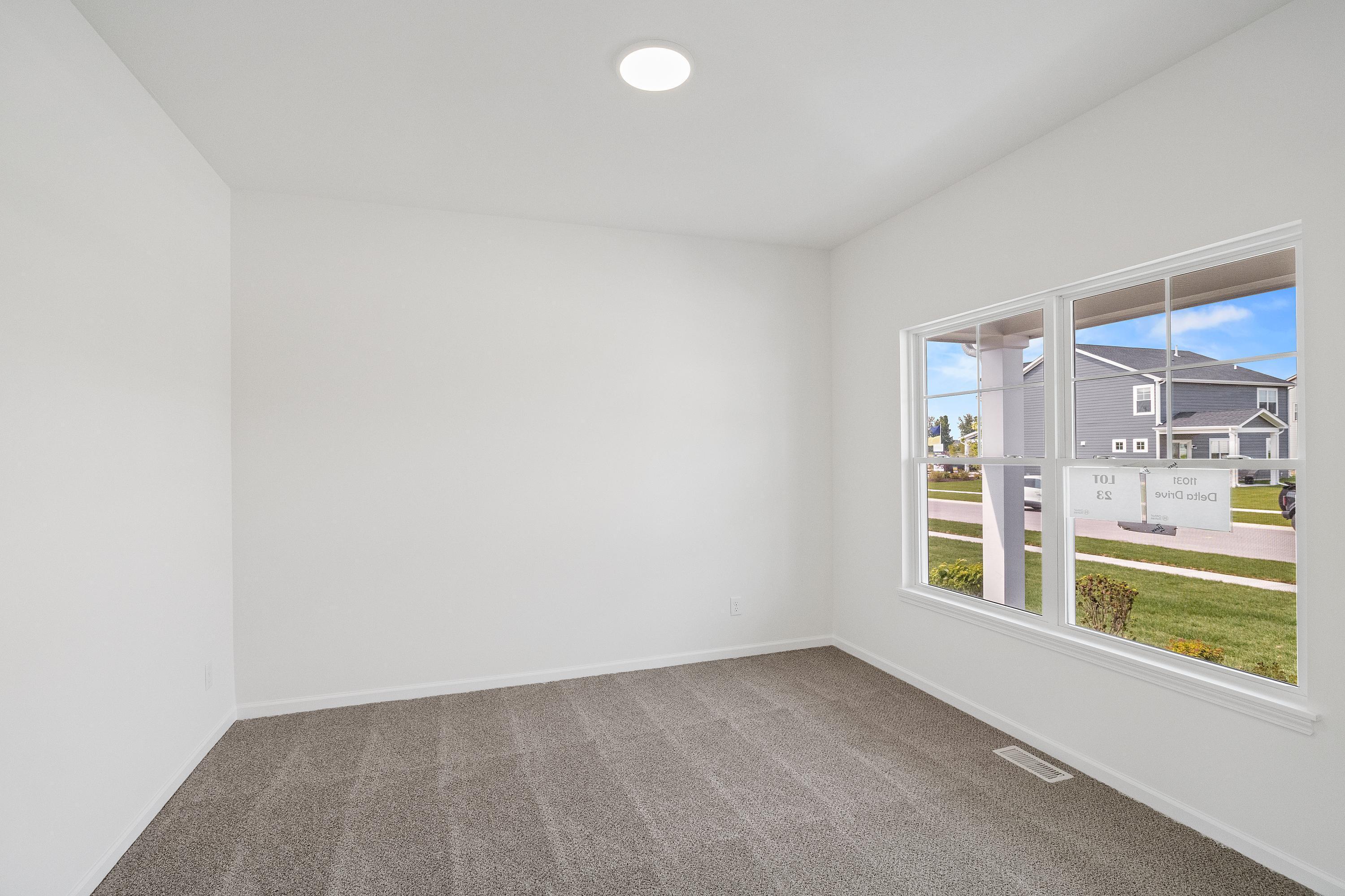 11031 Delta Drive Dyer, IN 46311 - Photo 3 of 24 an empty room with a window