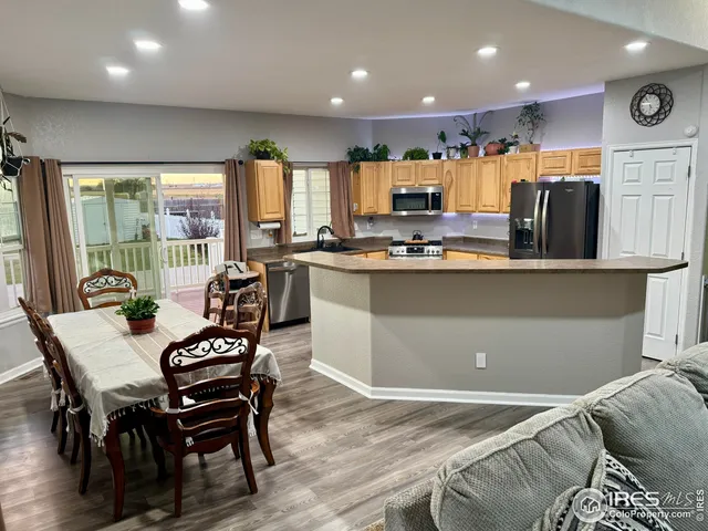 a view of a dining room with furniture