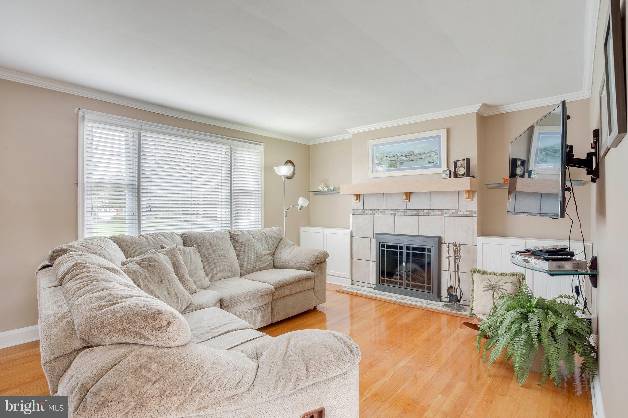 2105 Old Frederick Road Baltimore, MD 21228 - Photo 7 of 21 Lots of light, fireplace & wood flrs