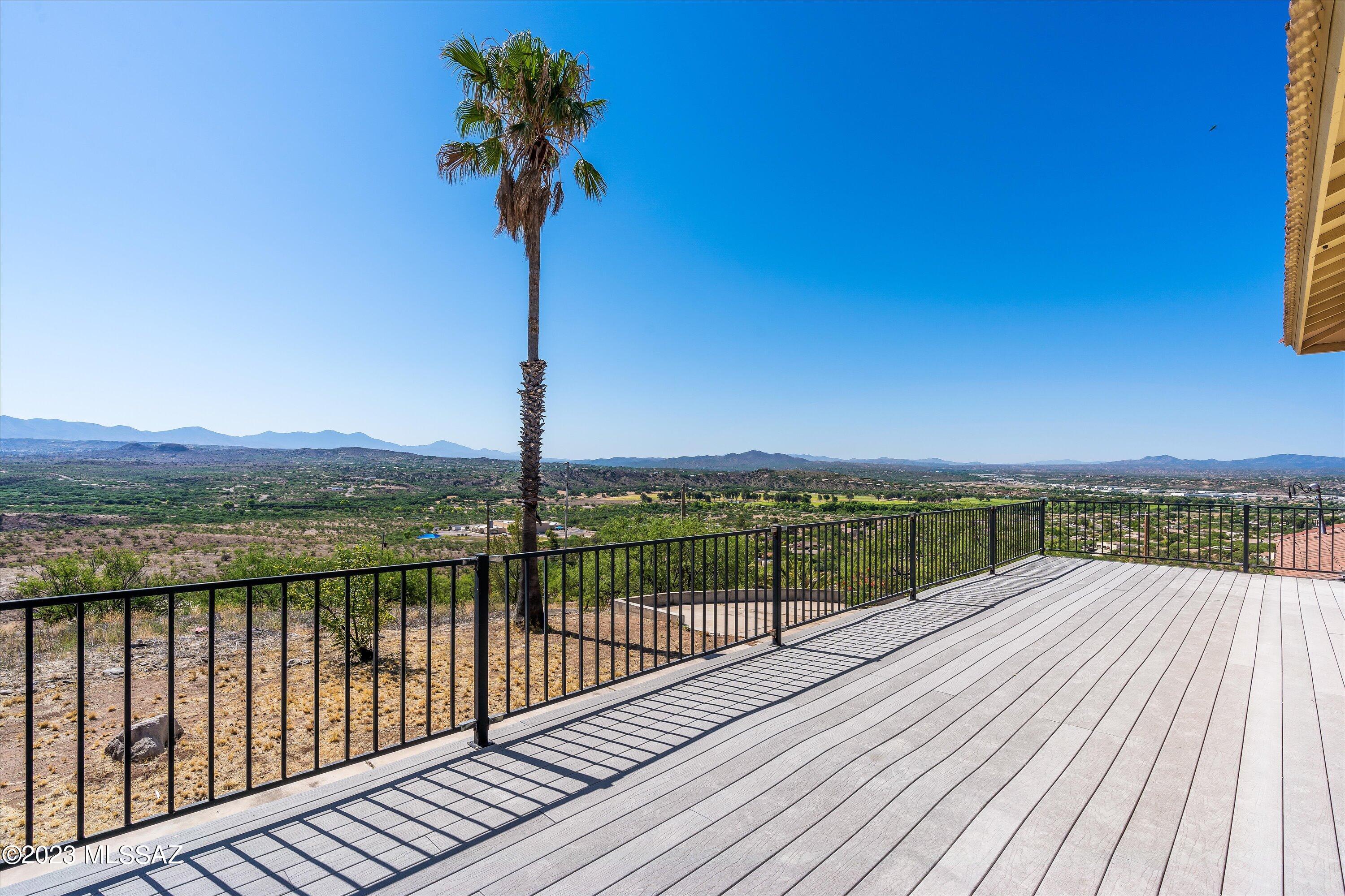 1226 Avenida Gloriosa Rio Rico, AZ 85648 - Photo 29 of 46 a view of a terrace with a lake view