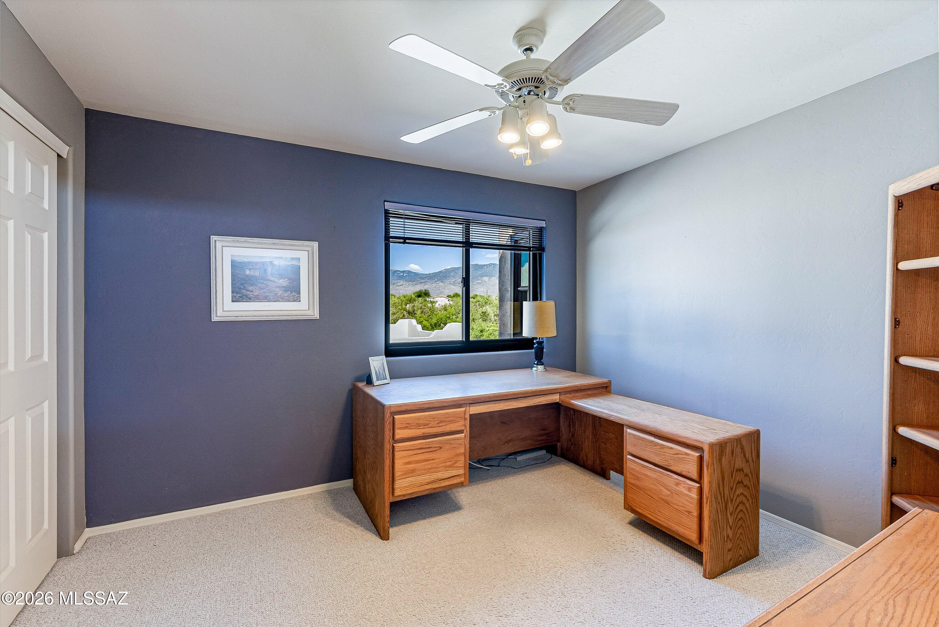 100 North Eastern Slope Loop Tucson, AZ 85748 - Photo 23 of 37 A gorgeous view of the Rincons out of this spacious bedroom can't be missed.