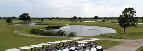 a view of a golf course with a garden
