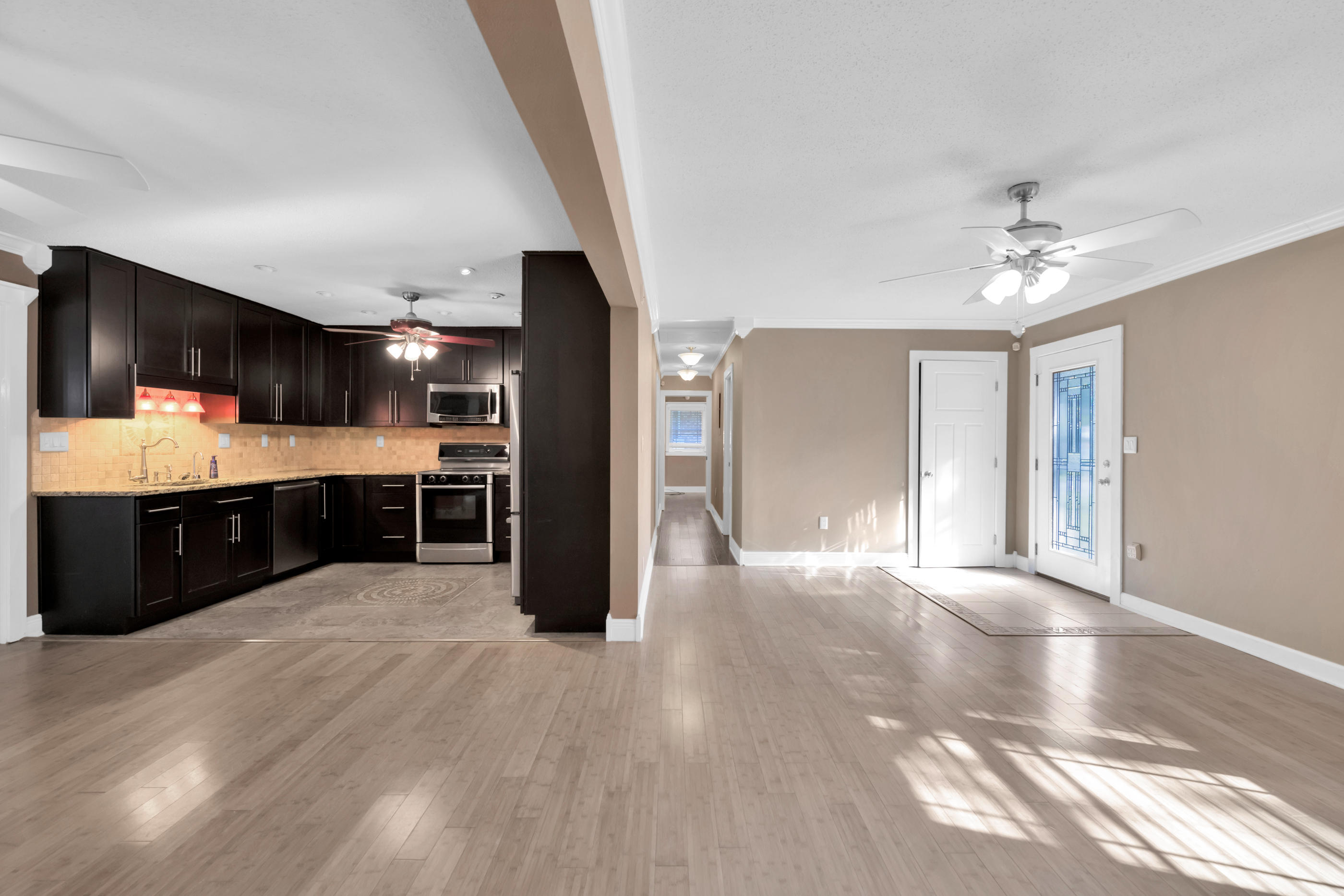 4 Roundabend Road Shalimar, FL 32579 - Photo 11 of 39 a view of a kitchen with a sink and a refrigerator