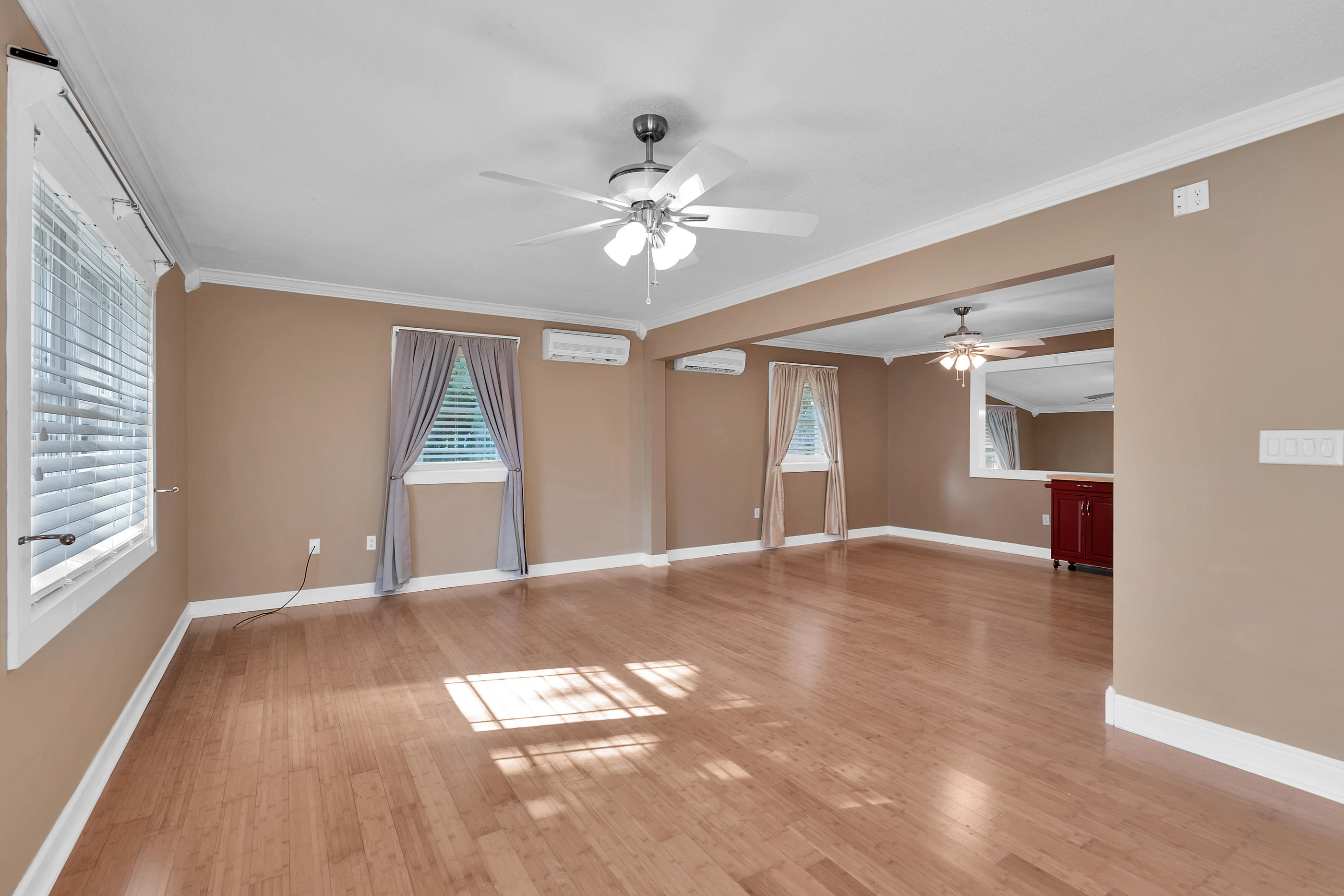 4 Roundabend Road Shalimar, FL 32579 - Photo 13 of 39 a view of empty room with wooden floor and fan