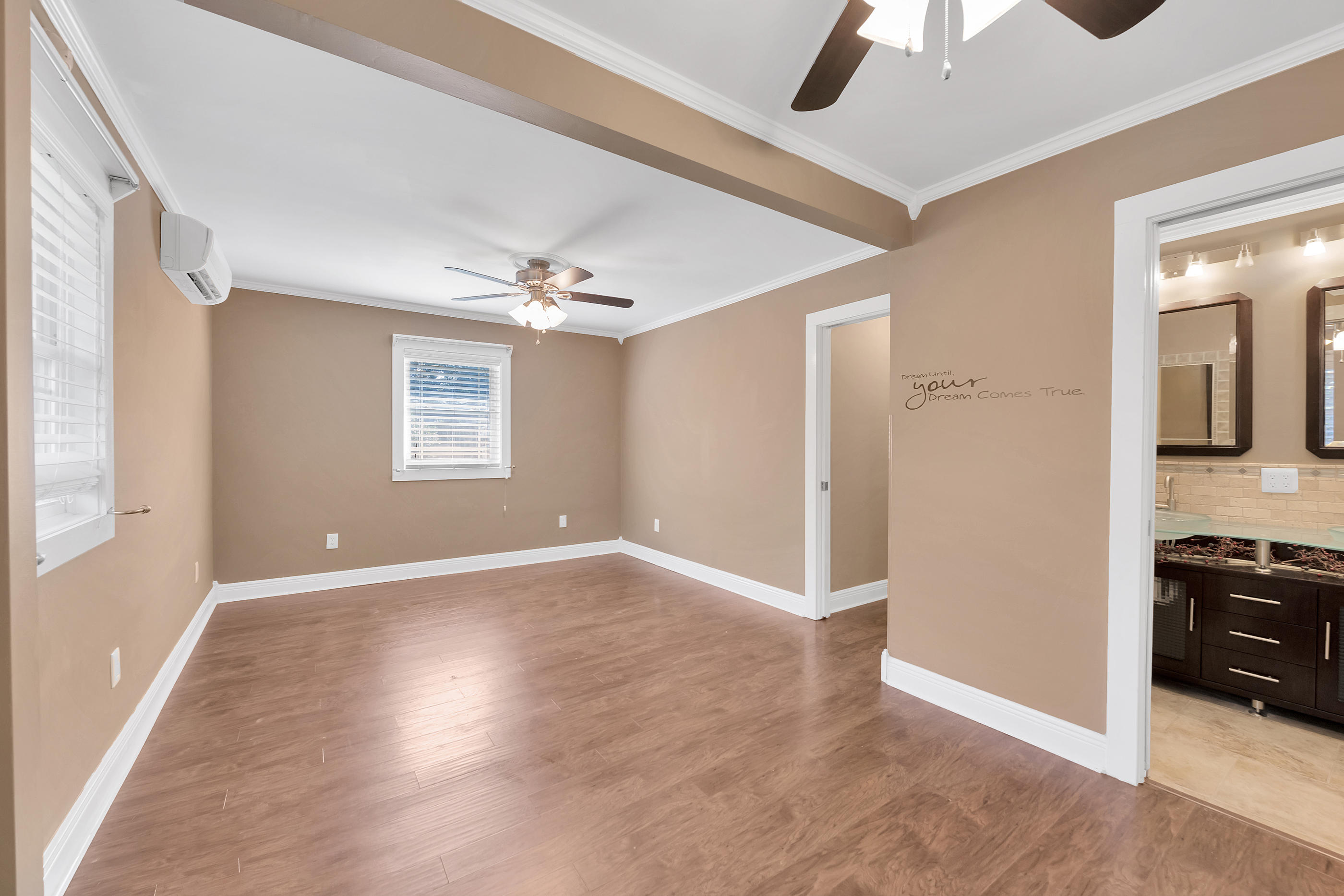 4 Roundabend Road Shalimar, FL 32579 - Photo 17 of 39 wooden floor in an empty room with a window