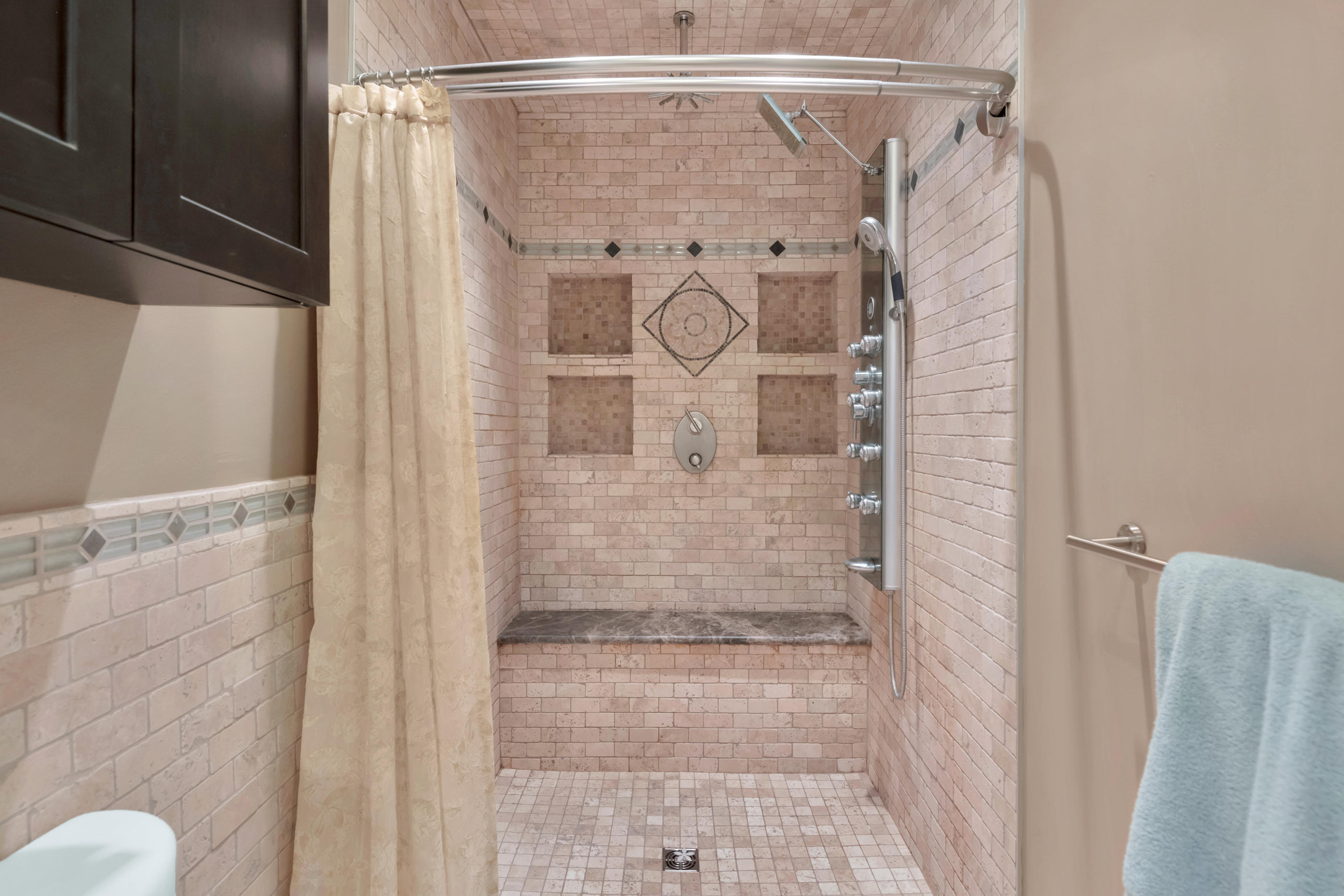 4 Roundabend Road Shalimar, FL 32579 - Photo 20 of 39 a bathroom with a glass shower door