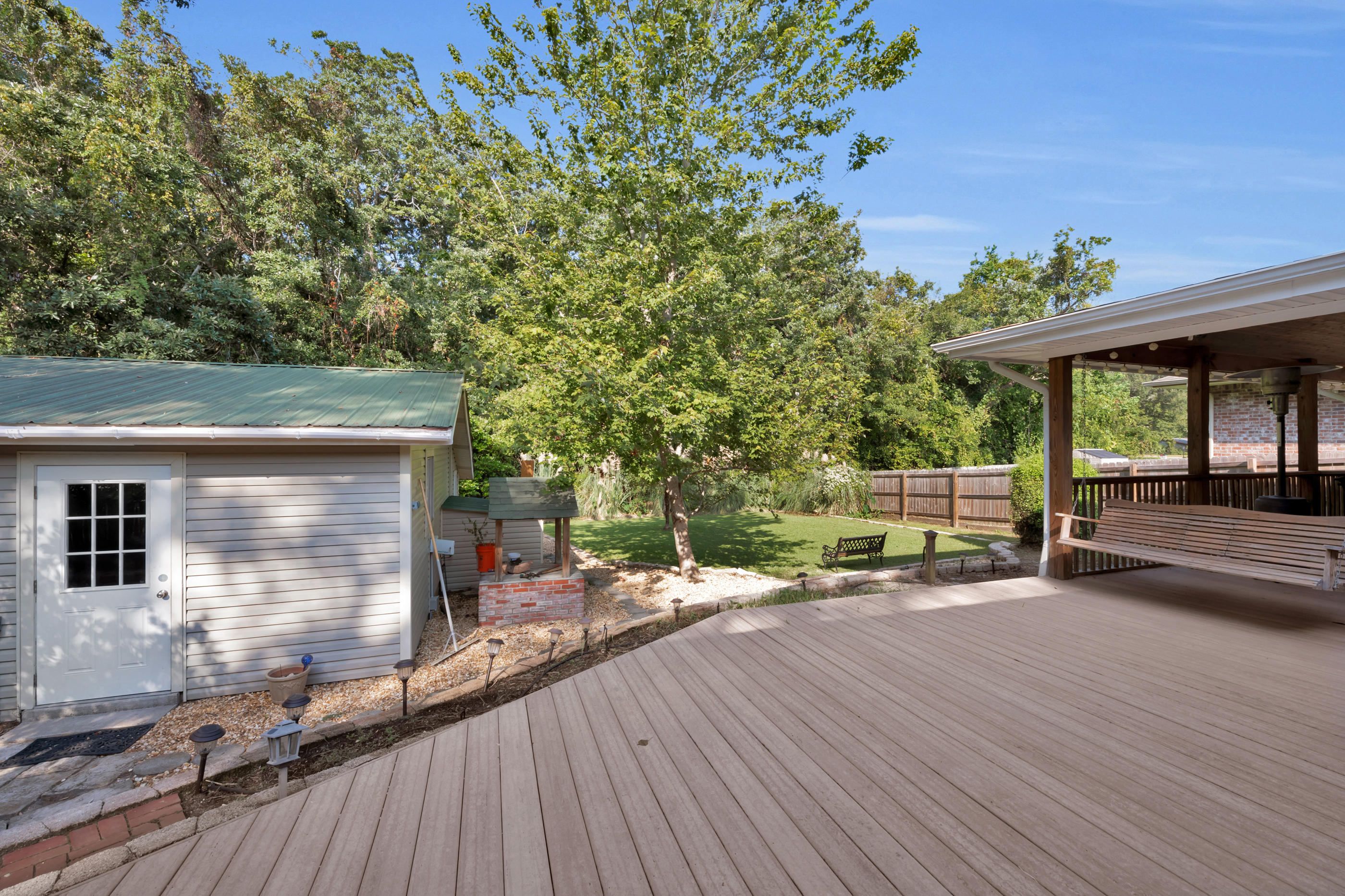 4 Roundabend Road Shalimar, FL 32579 - Photo 31 of 39 a view of a house with backyard and sitting area