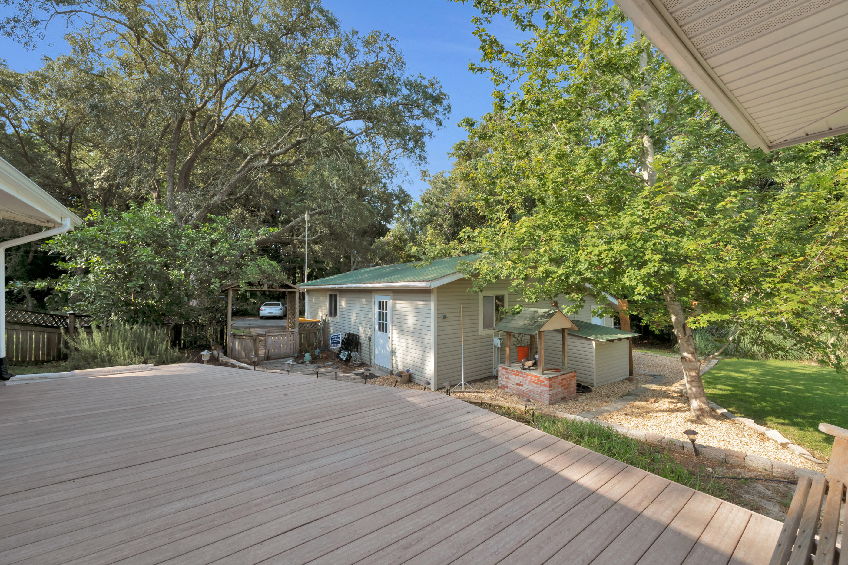 4 Roundabend Road Shalimar, FL 32579 - Photo 34 of 39 a view of a house with backyard and sitting area