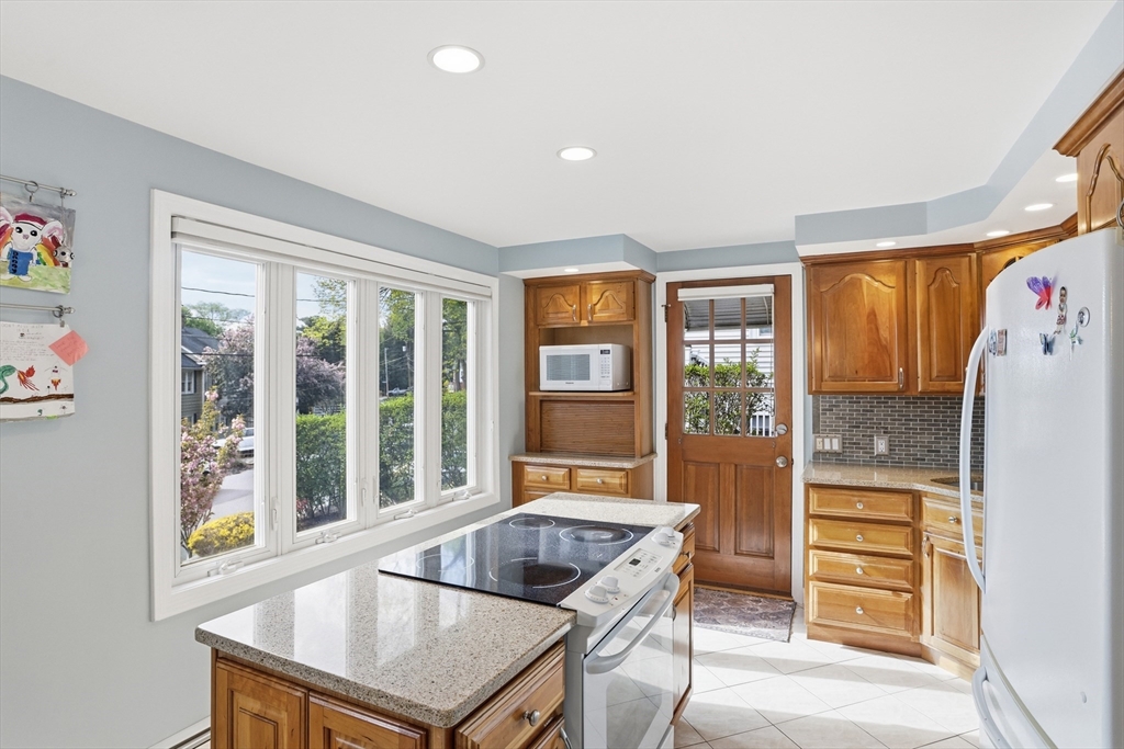 115 Collincote Street Stoneham, MA 02180 - Photo 9 of 25 a living room with furniture and window