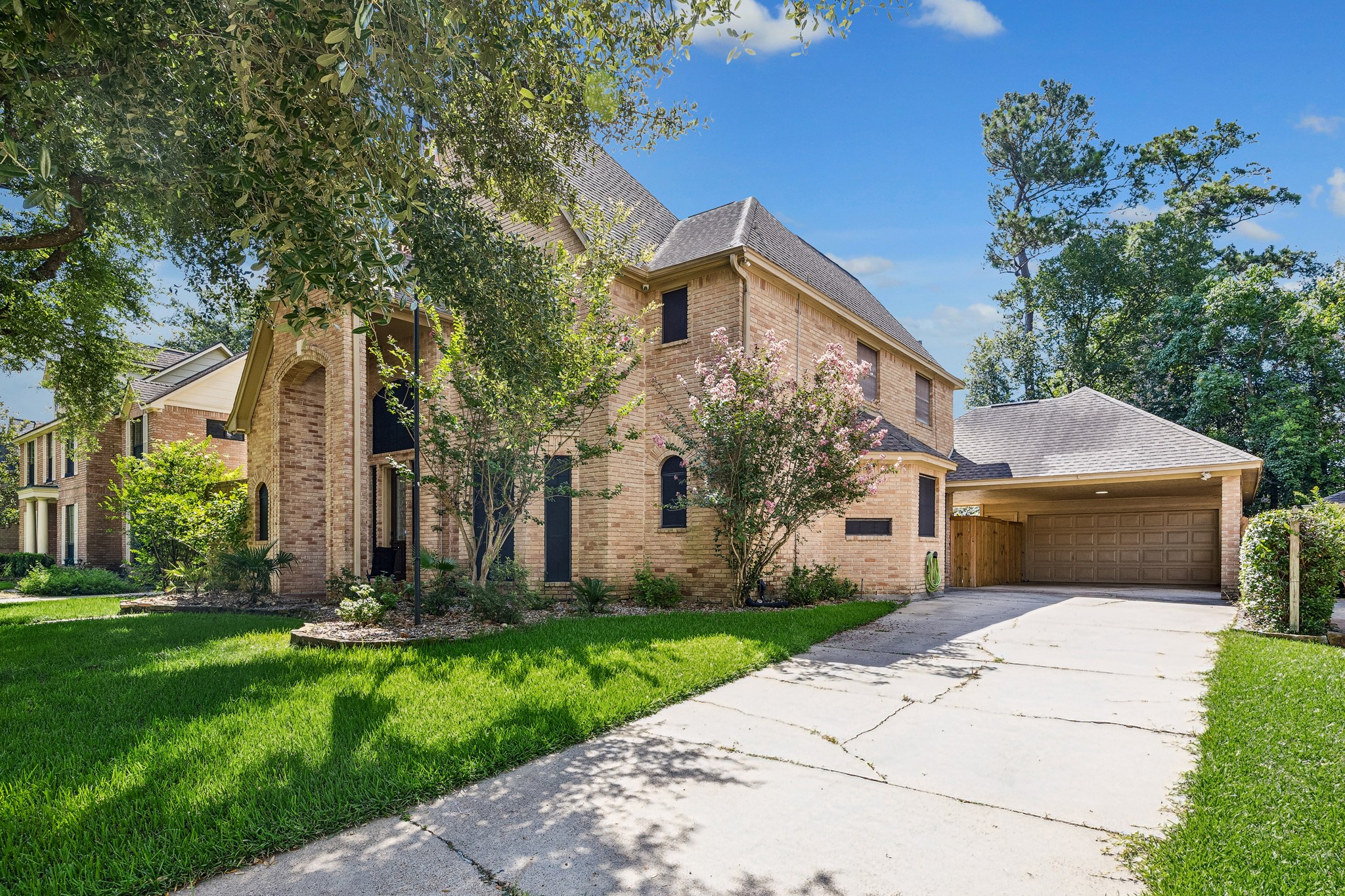 5823 Ashmere Lane Spring, TX 77379 - Photo 5 of 35 a front view of house with yard and green space
