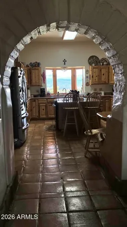 a view of a balcony with chairs